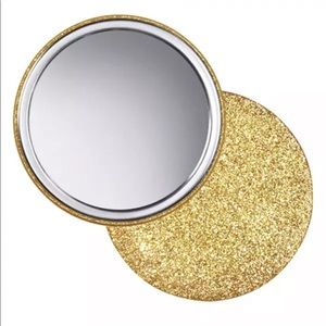 Nwt in packaging Avon gold glittery handheld purse pocket book lipstick mirror